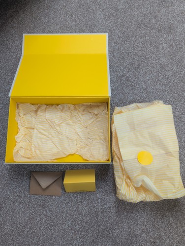 Selfridges yellow carton - &,