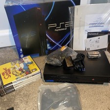 Play Station 2  Console Boxed / New Controller / Cables/ Instruction & 4 Games