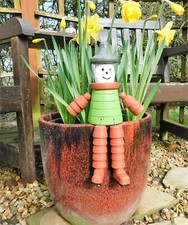 WOODEN FLOWER POT MAN