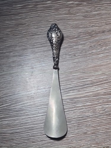 Antique shoe horn with - shoe,