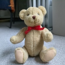 Gund classic teddy bear with moving parts sitting 
