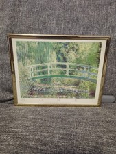Claude Monet framed print: Lilies and Japanese Bridge. Textured canvas paper.