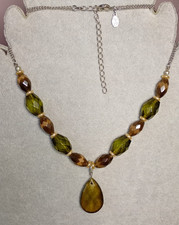 GREEN AND BROWN FACETED GLASS