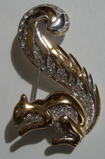 Gold and Silver Tone Diamante Roll Clasp Squirrel Brooch.