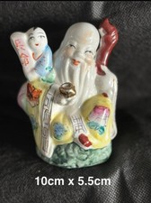Small Ceramic Chinese God / Buddah  figurine  40+yrs old  10cm x 5.5cm ( white) 