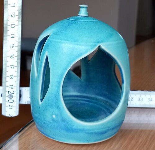 Turquoise pottery tea light