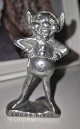 Metal lucky pixie figure - metal,