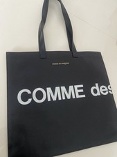 Comme Des Garçons Logo