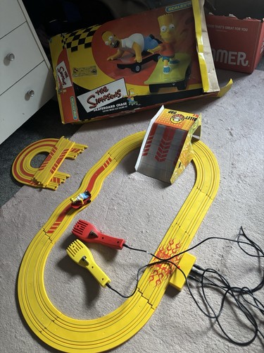 Micro scalextric the simpsons - scalextric,