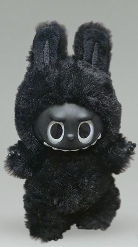 Cute and unique black doll - and,