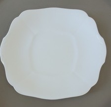 Vintage White Cake Serving Plate With Embossed Design On Handle Area.