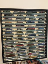 Scale model trains comes - n,