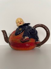 Nini oriental decorative resin Teapot Pumpkin/Squash with child on top.