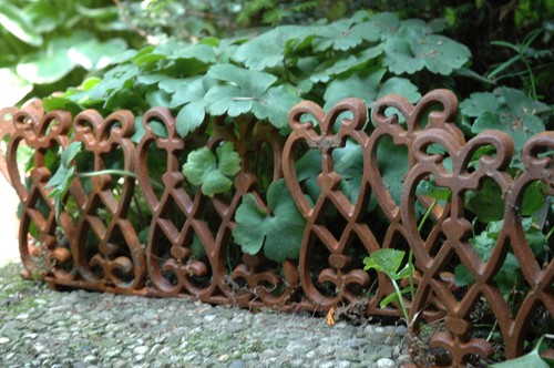 Ornate cast iron brown lawn - brown,