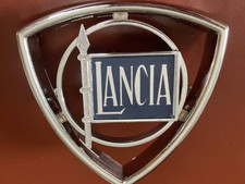 LANCIA FULVIA/BETA COUPE-JOLLY NICE NEW UNUSED GRILLE BADGE.