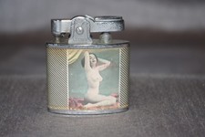 Vintage lighter. Nude pin up