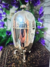 Art Deco silver-plated sugar dispenser, also known as a sugar shaker or caster.