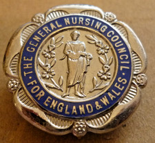 VINTAGE ENAMEL BADGE GENERAL