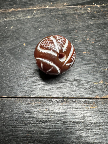 Hand carved brown agate bead - hand,