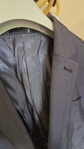 Charcoal grey suit and - grey,
