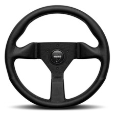 Genuine Momo Monte Carlo black stitch, black leather 320mm steering wheel.
