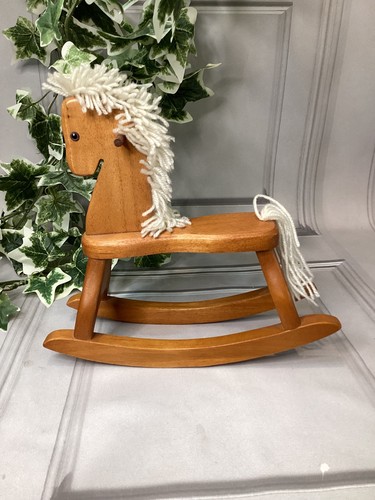 One wooden rocking - , horse