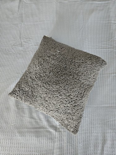 Dunelm charcoal grey cushion.