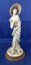 B. Merli Figurine 'Lady In