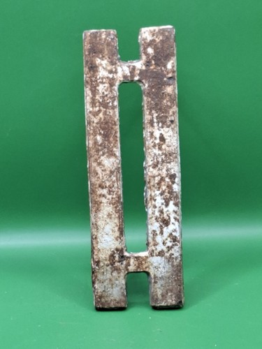 Salvaged cast iron roman - iron,