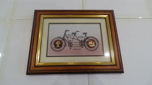 Framed the penny factory - penny, hand