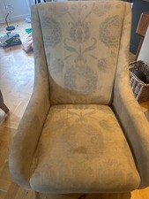 Arm chair in need of recovering