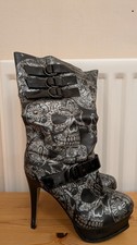 Iron Fist Womens Heeled Boots Skulls and Buckles Size 6