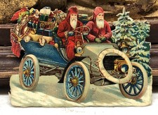 Pair of Santas in Vehicle w/