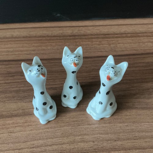 Group three ceramic cats - of,