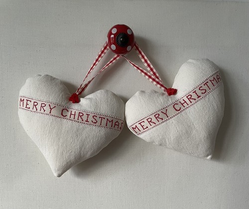 Pair heart door hangers in - of,