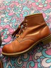 White top,capped boots not