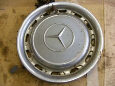 Mercedes 14 inch stainless steel wheel trims hub caps. Genuine Mercedes parts.