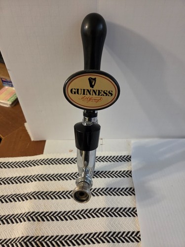 Guinness beer tap handle with - tap,