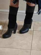 Poetic license black leather boots size 5