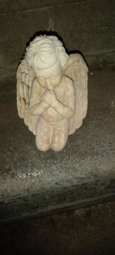 Weathered praying cherub - praying,