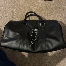 Carolina Herrera Bad Boy black duffle bag