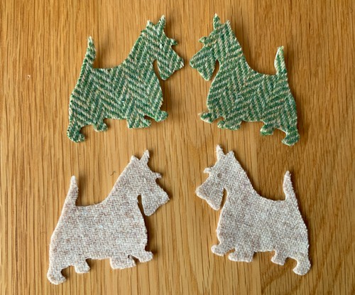 Four small scottie dog - four,