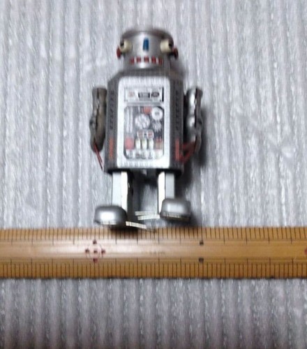 Tin style toy robot retro - style,