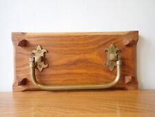 Vintage Church pew brass walking stick umbrella holder on oak panel