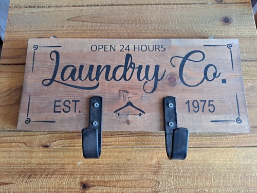 Wooden laundry sign ironing