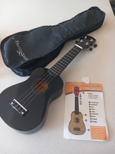 Brand new ukulele black with - brand,