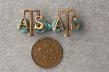 A pair of brass WW2 period ATS