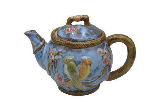 Tea pot decorated - with, bird