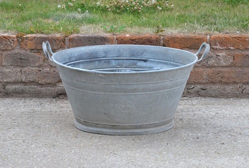 Old galvanised washing bowl - old,