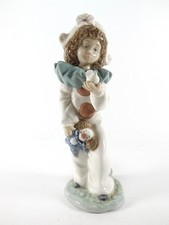 LLADRO NAO  FIGURINE CALLED " A BIRD IN HAND" 1TEM NUMBER 1100 REF 87/2
